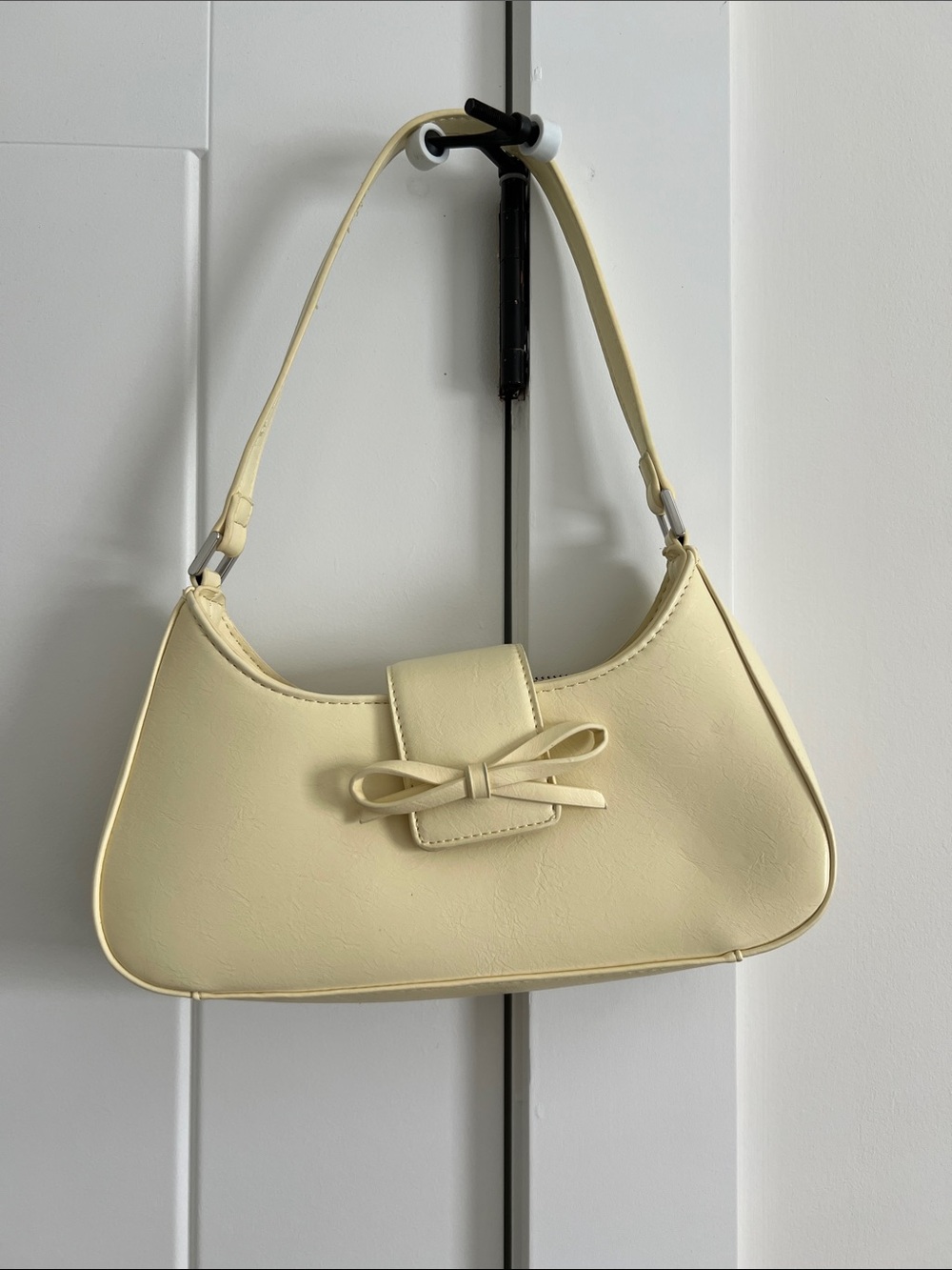 Urban Outfitters buttery Yellow Bow-Front purse